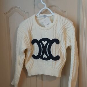 Cream Cable-Knit Crew Sweater with Black Emblem